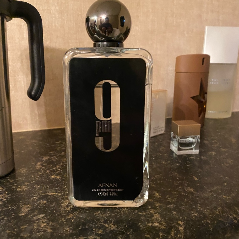 3.4 oz AFNAN 9 pm smells exactly like JEAN PAUL GAUTHIER ULTRA MALE BUT BETTER